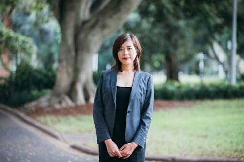 Woman in Suit at Park