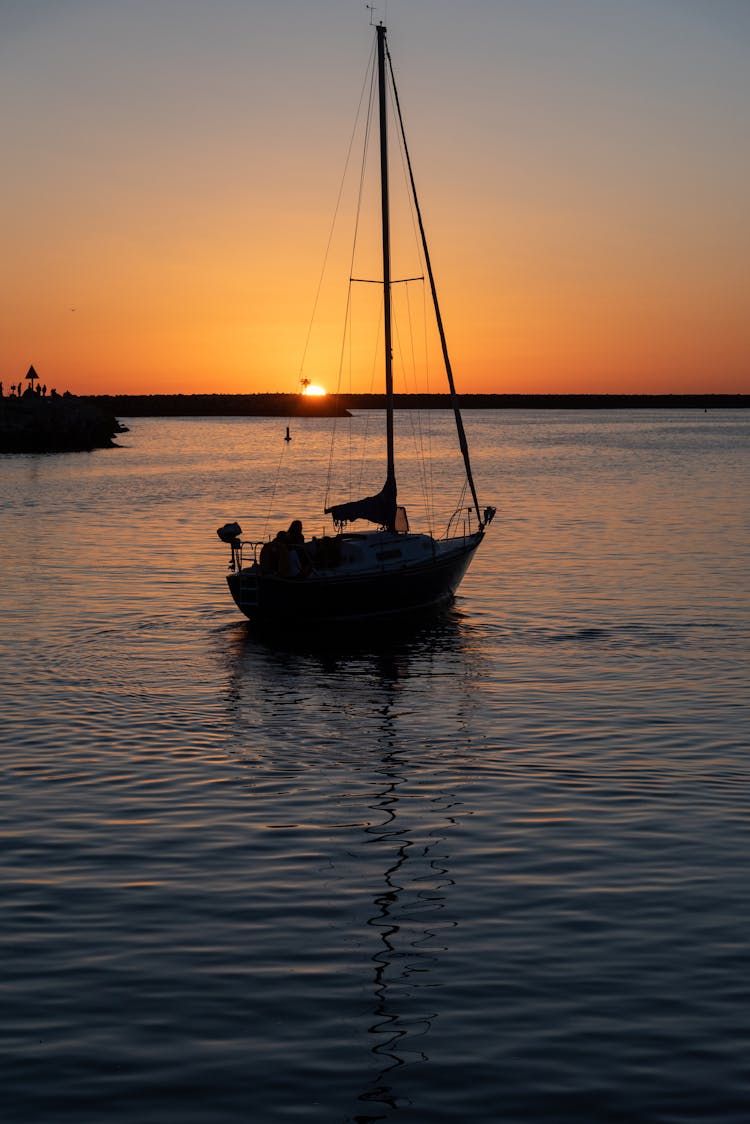 Sailboat Silhouette At Sunset