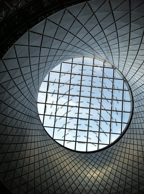 Modern, Circular Wall under Glass Ceiling