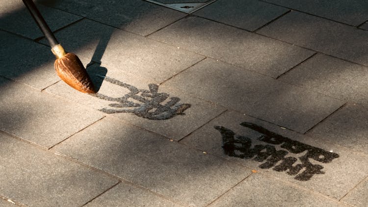 Painting Writing On Pavement