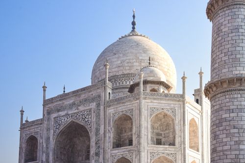 Free Close-up of the Taj Mahal showcasing intricate Mughal architecture and marble design. Stock Photo