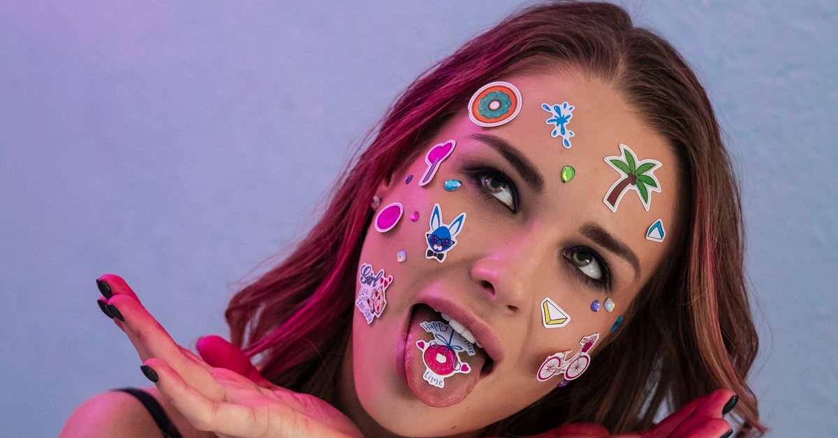 People Using Stickers Woman with Face in Stickers Goofing around · Free Stock Photo