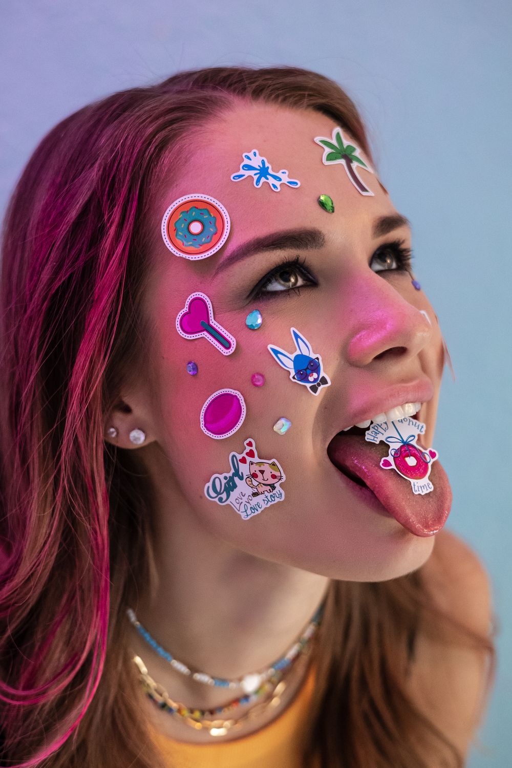 People Using Stickers Woman with Stickers on Face · Free Stock Photo
