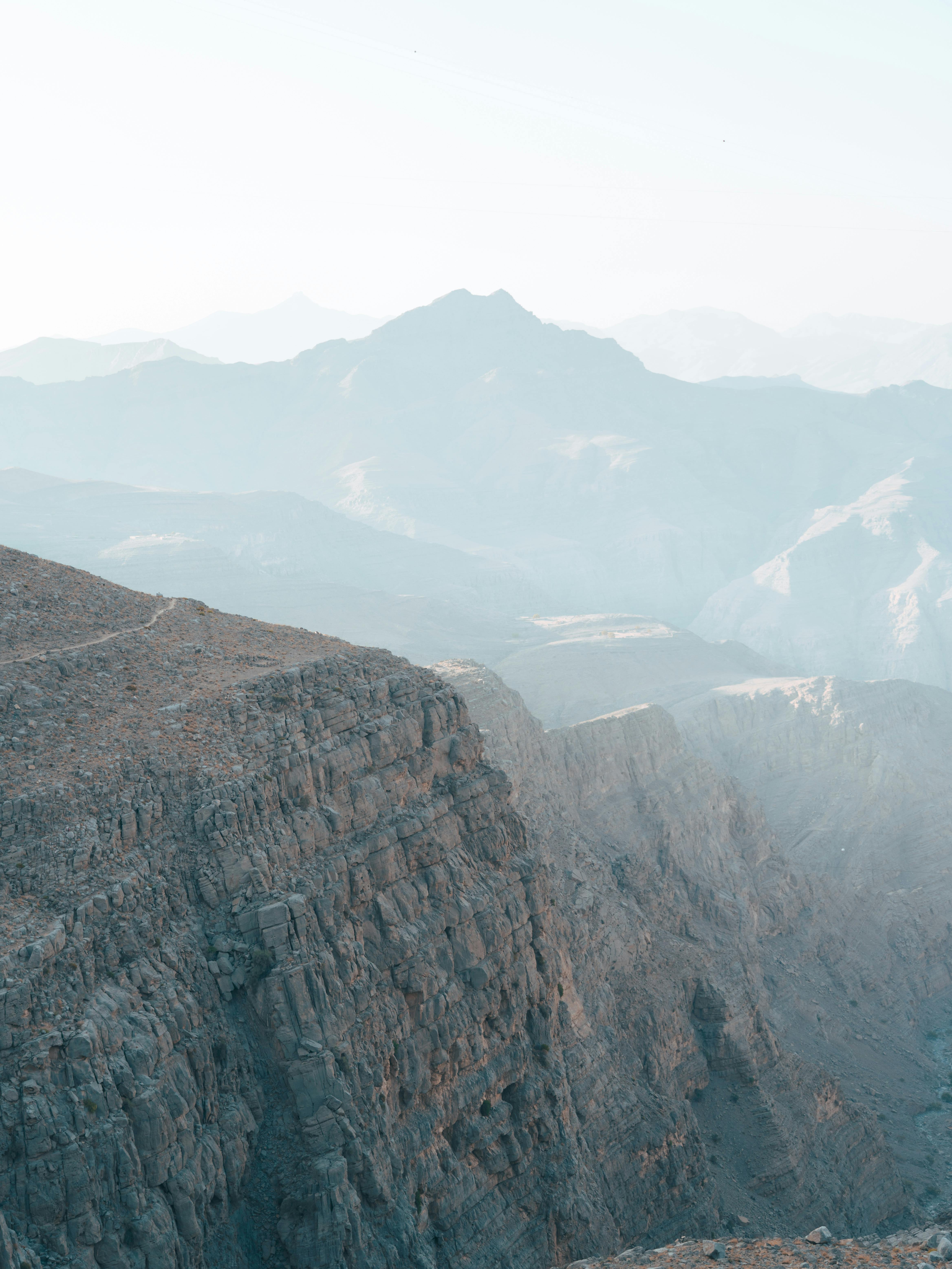 a person standing on top of a mountain