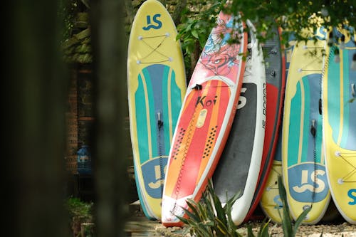 Stack of Inflatable Stand Up Paddle Boards