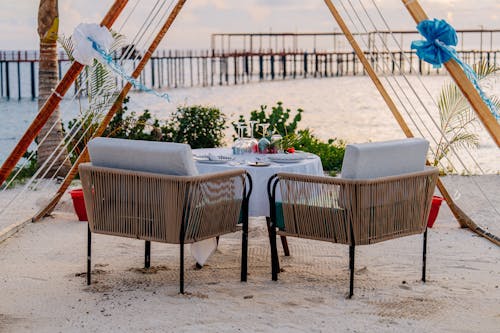Banquet Table and Chairs on a Beach 