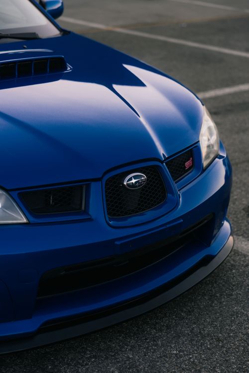 Free Detailed view of a blue Subaru sports car front, parked in Cremona. Stock Photo