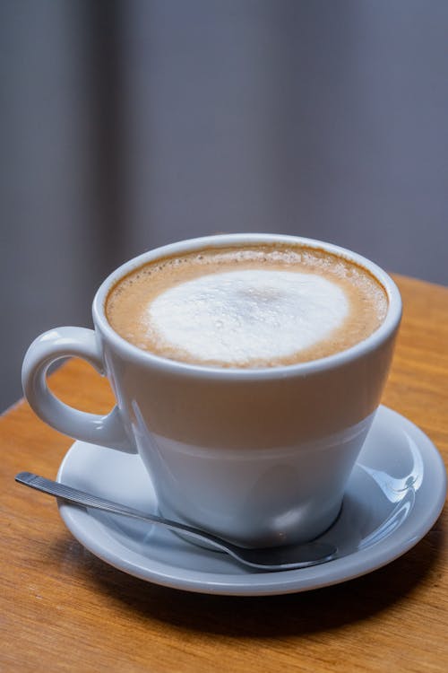 Free Coffee in Cup on Saucer Stock Photo