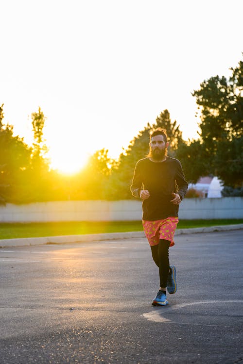 Man Jogging at Sunrise
