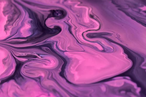 Close-up of a Painting in Pink and Purple Shades Made with Pouring Technique