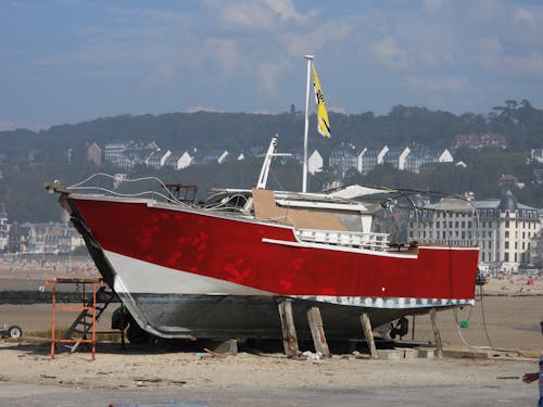 Boat on Beach in Town