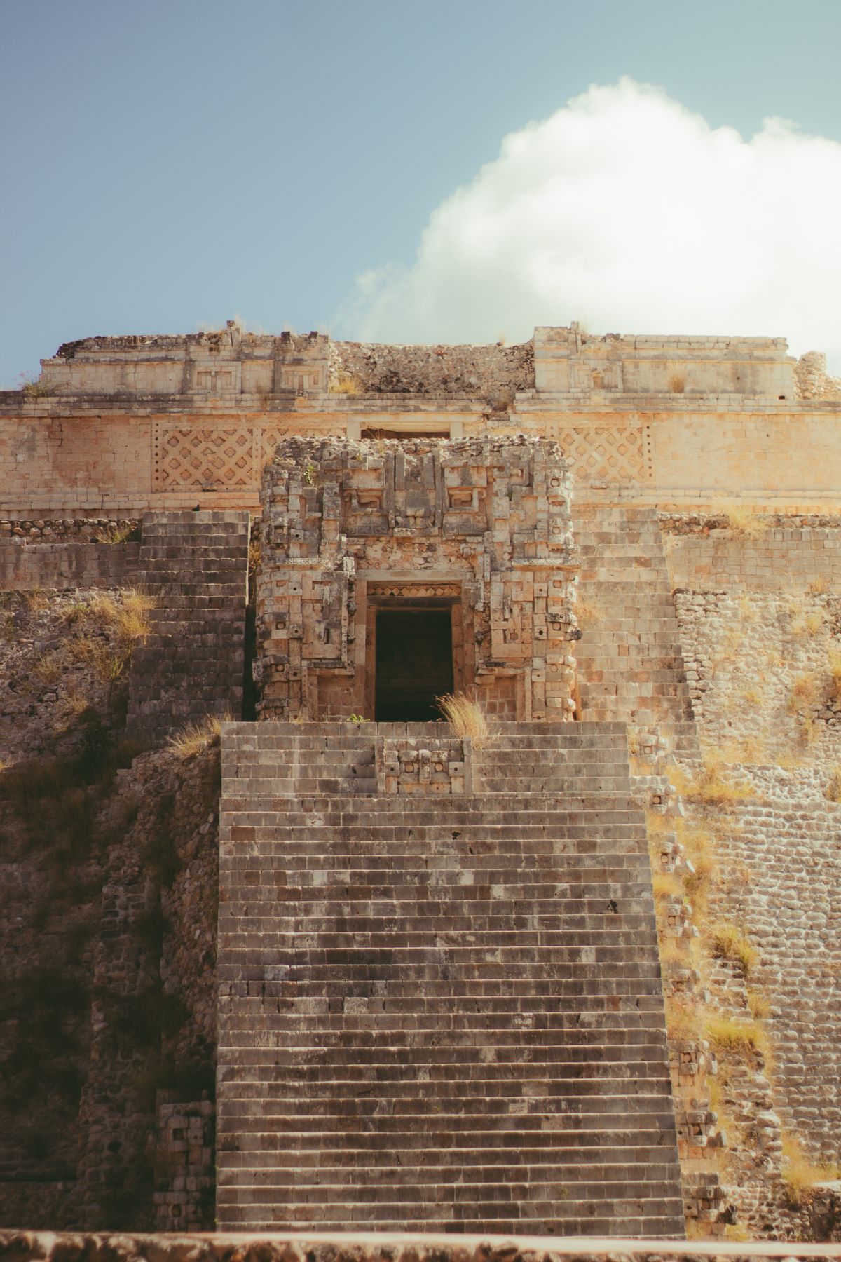 Explore the intricate architecture of the ancient Mayan ruins at Uxmal, Mexico.