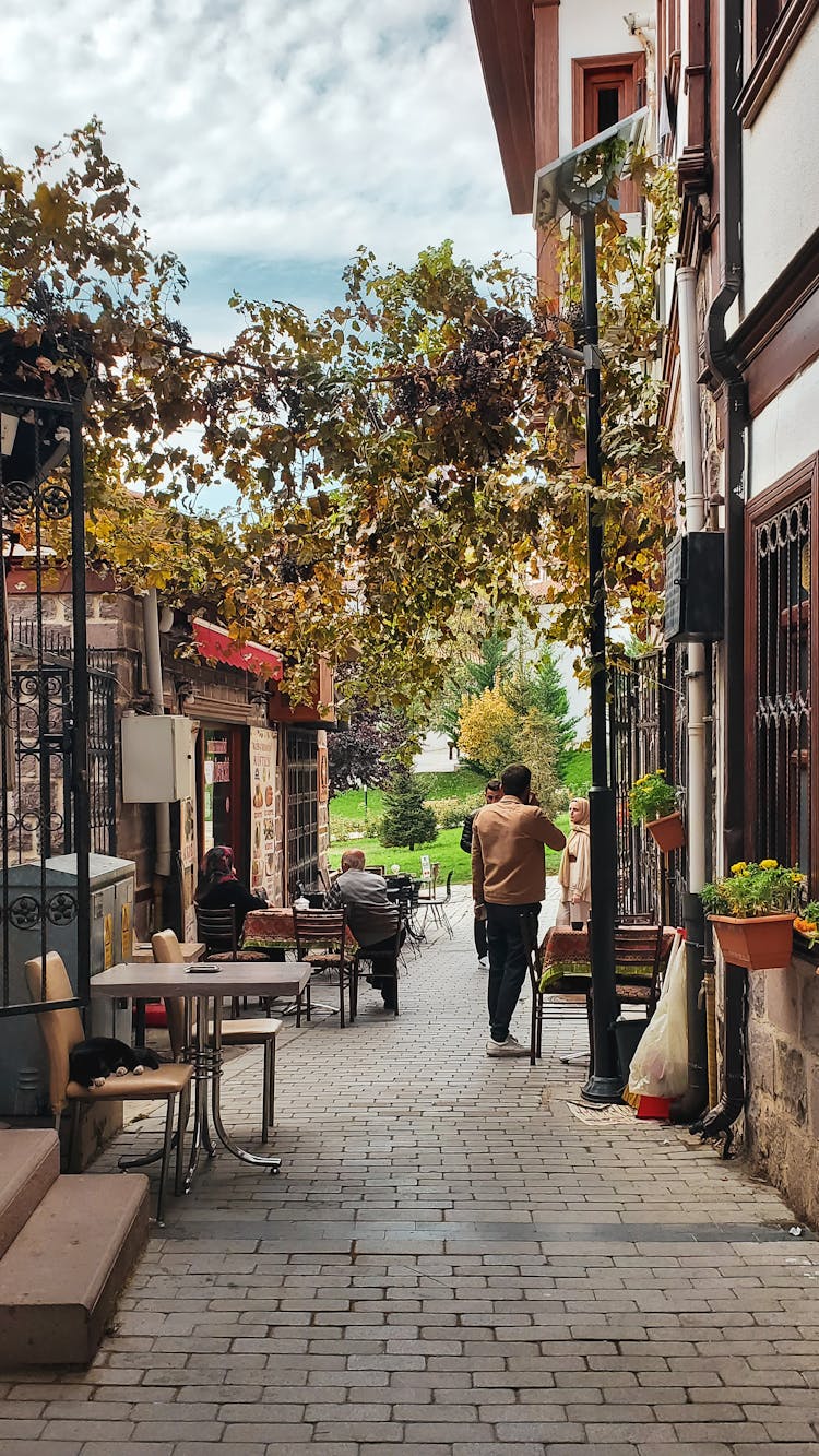 Cafe Tables On Sidewalk