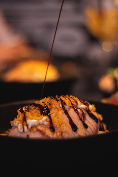 Bowl with Dessert Decorated with Chocolate Sauce