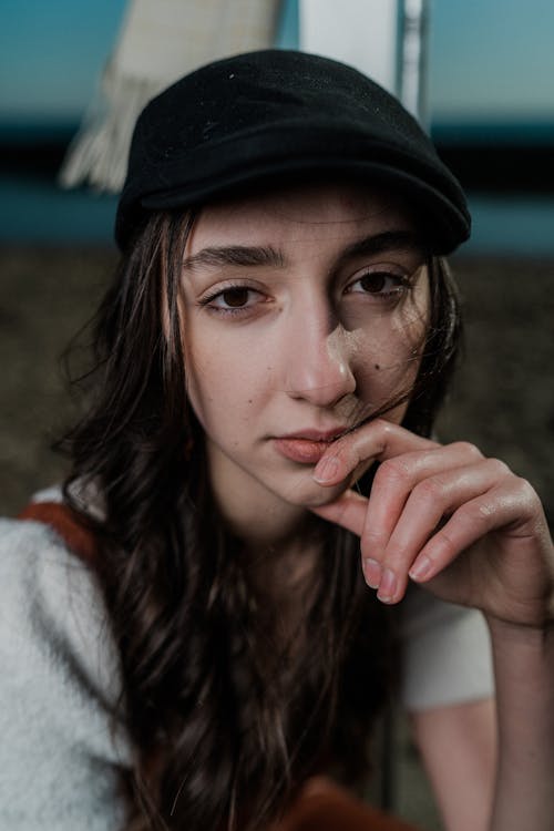 Free A young woman with a hat on her head Stock Photo