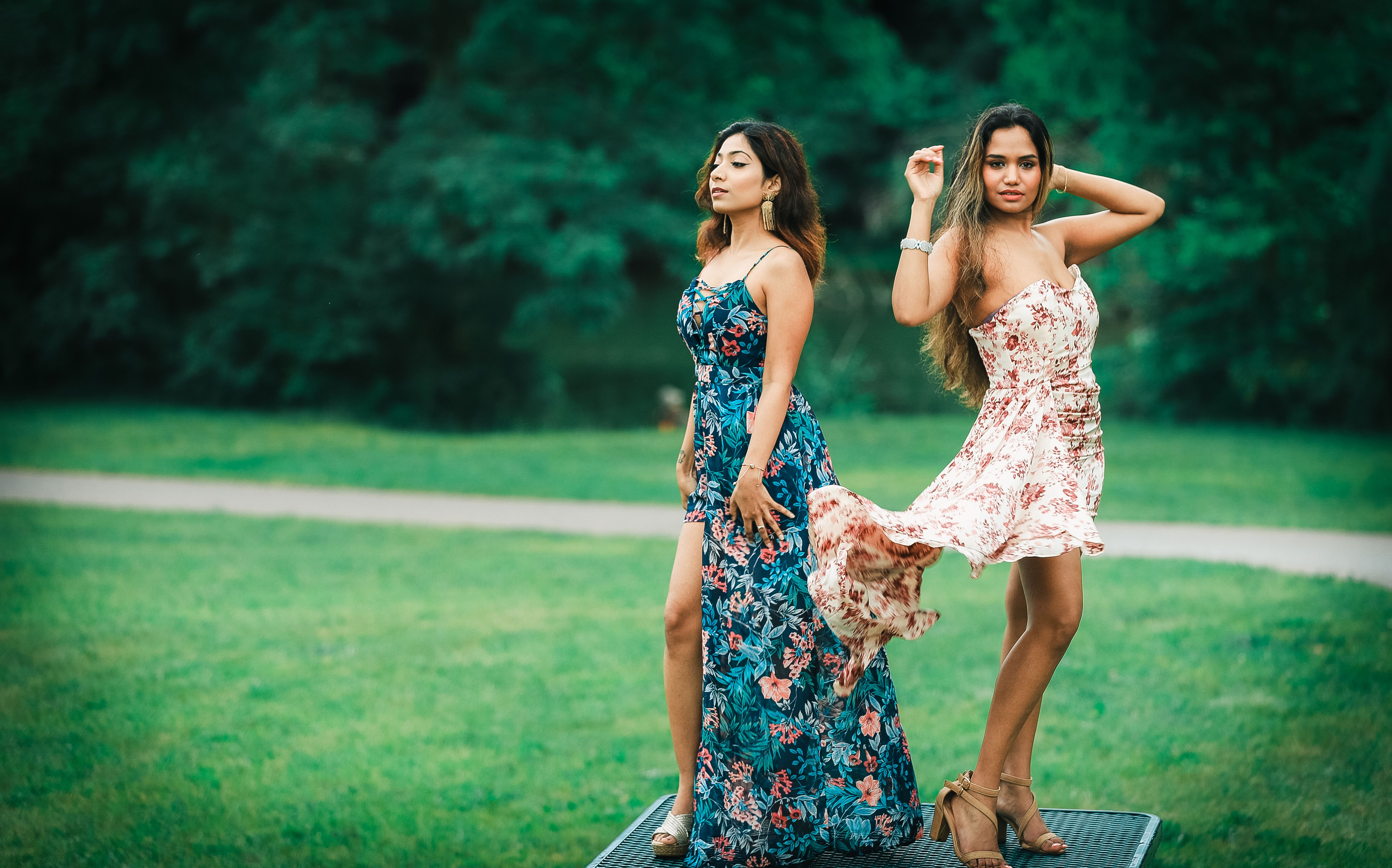 A Woman Posing in Red Dress in Park · Free Stock Photo
