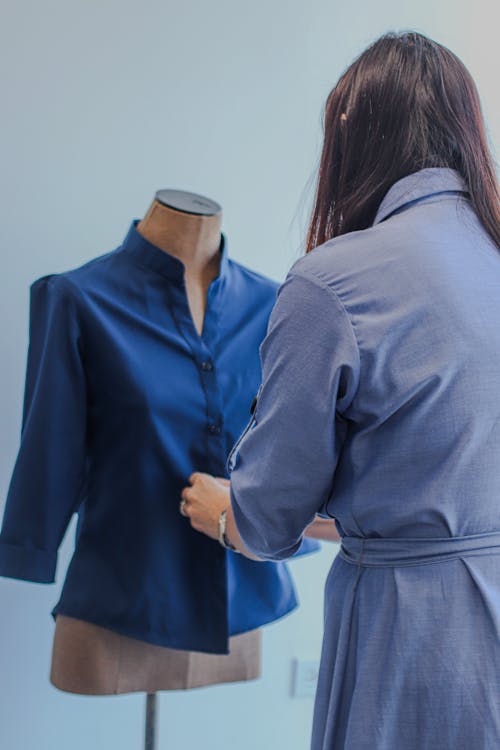 Woman Dressing the Mannequin