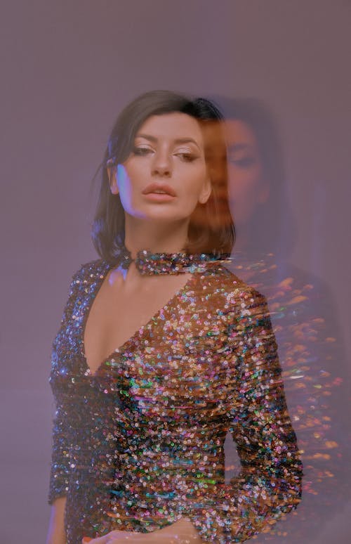 Model in a Sequin V-Neck Dress 