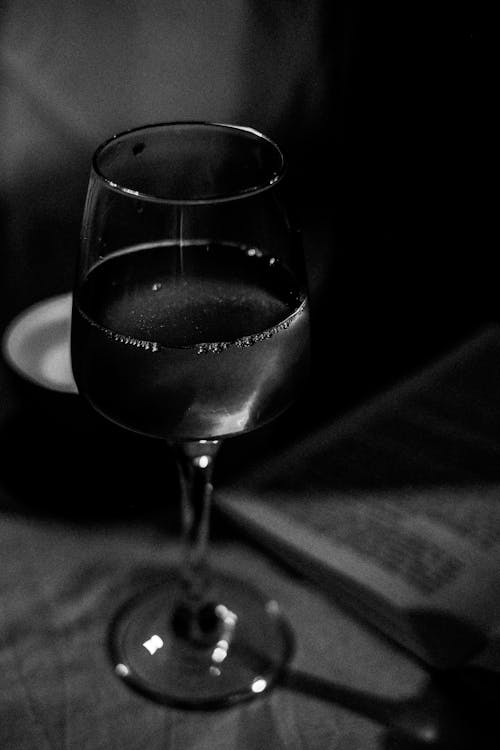 Black and White Photography of a Drink in a Glass 