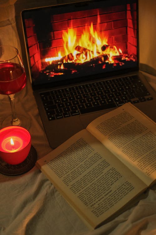 Book and Candle by Fireplace 