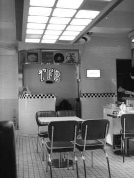 Vintage style café interior in Seoul with retro furnishings in black and white.