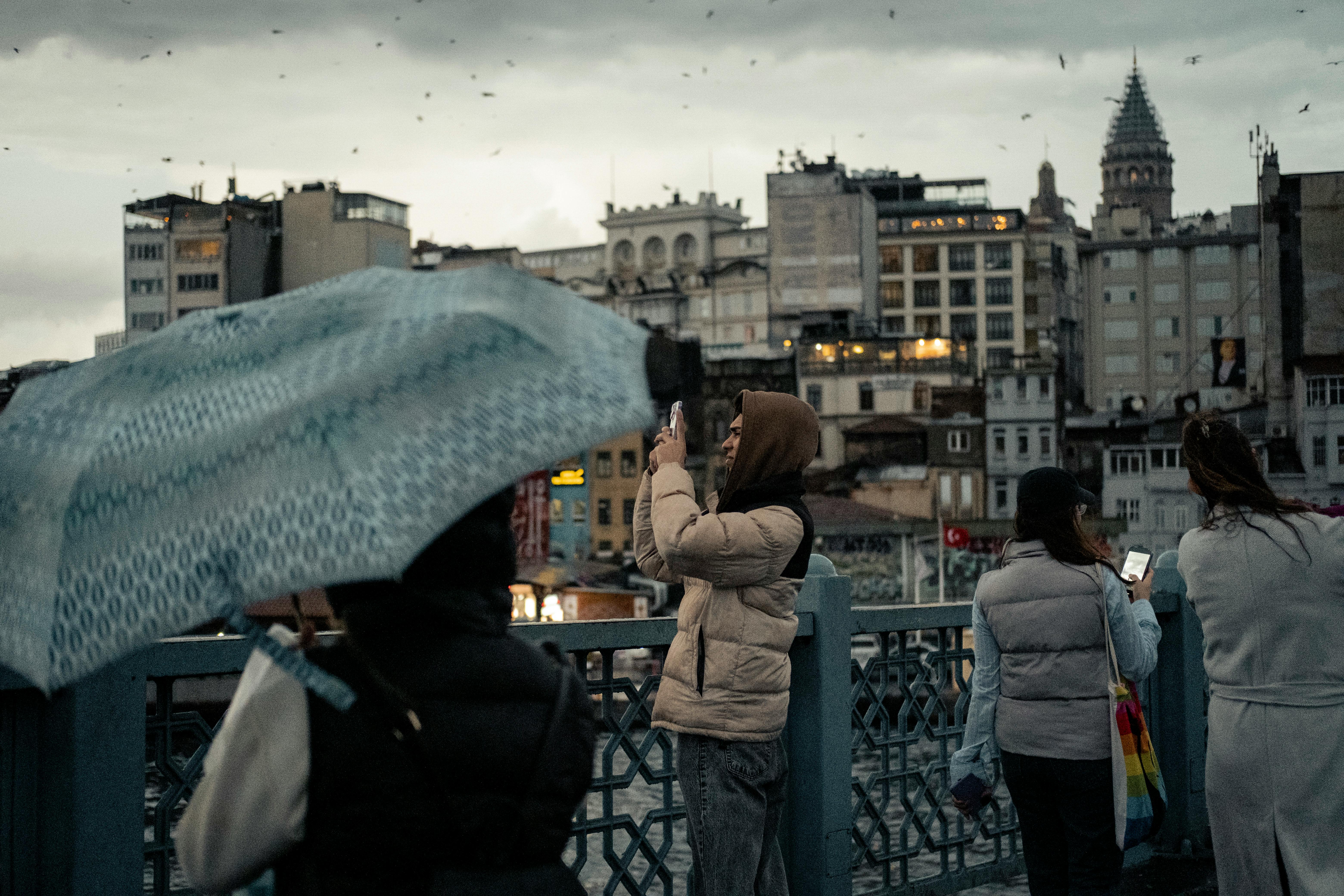 Traveler using mobile phone abroad