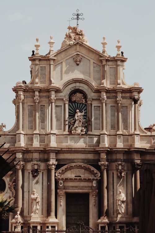 Free Explore the intricate baroque facade of a historic cathedral in Catania, Sicily, Italy. Iconic European architecture. Stock Photo
