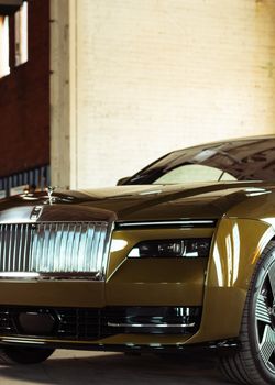 Elegant luxury car displayed indoors in Ontario, emphasizing sophistication and design.