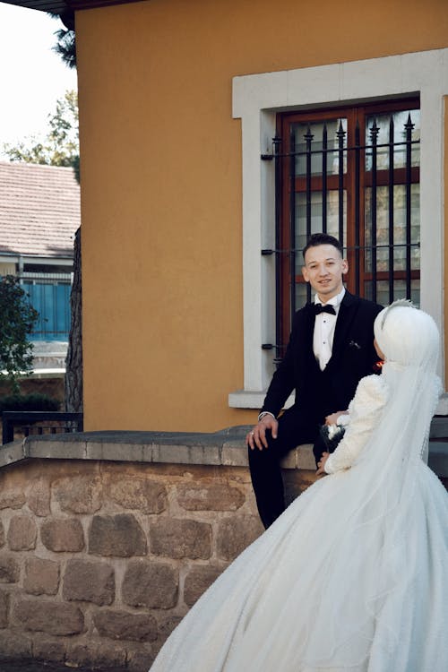 Happy Couple Posing on Wedding Day