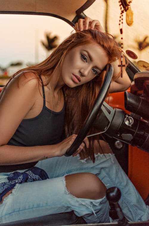 Free Woman Sitting in a Car Stock Photo