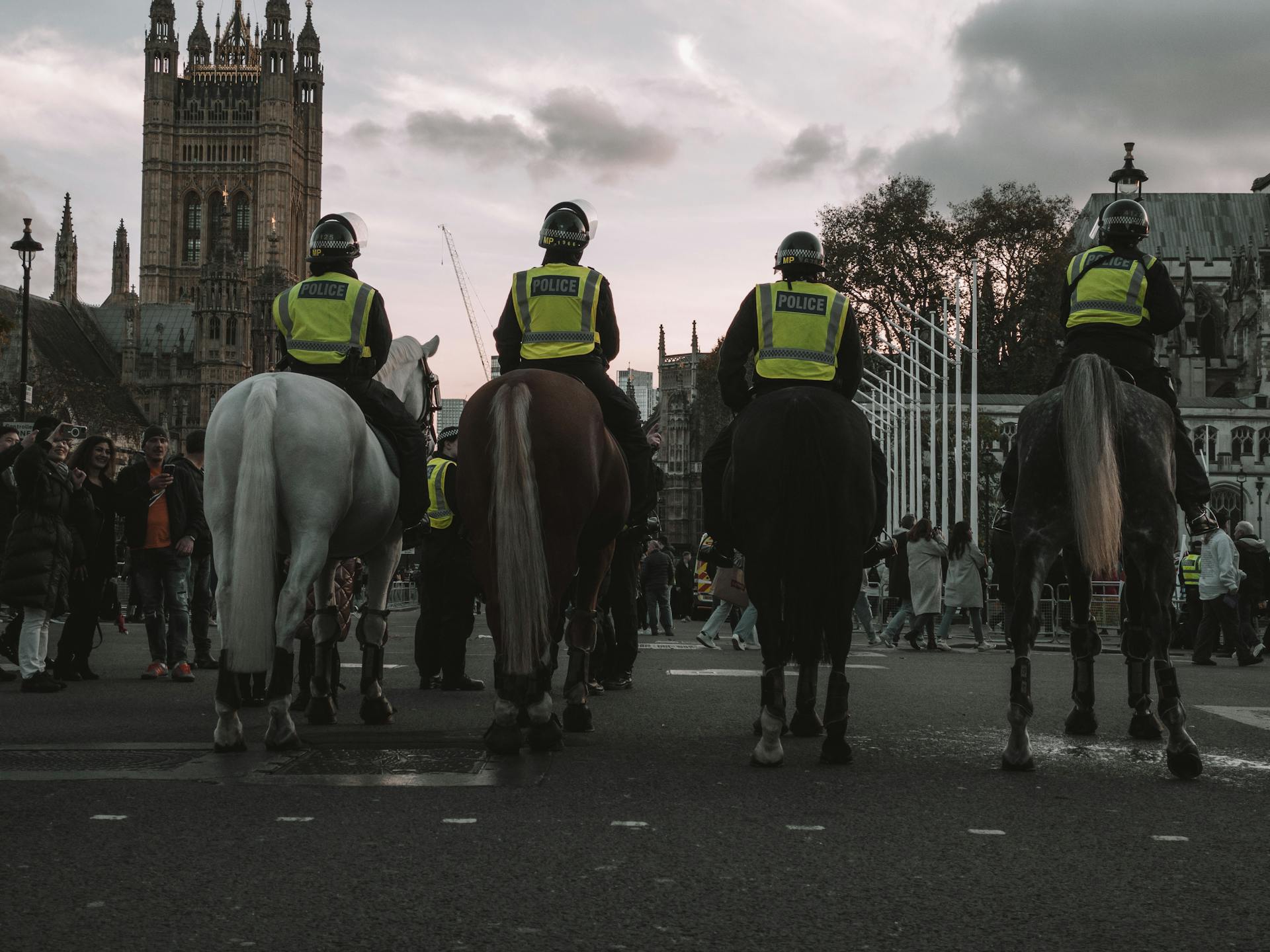 Police Officers on Horseback Guarding the Streets of London in Front of The Houses of Parliament