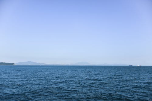 Gratis stockfoto met aan zee, heldere blauwe lucht, kust