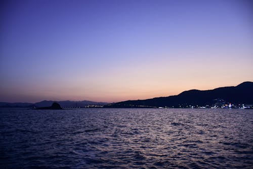 Gratis stockfoto met strand zonsondergang