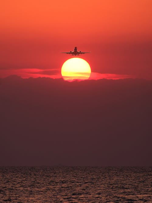 Ilmainen kuvapankkikuva tunnisteilla auringonlasku, aurinko, lentäminen