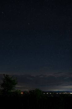 A breathtaking view of the starry night sky over Maple Springs, MN.
