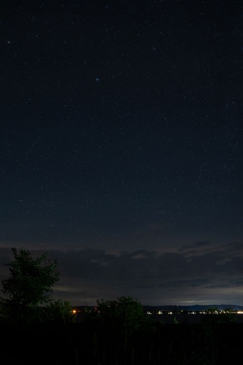 Free A breathtaking view of the starry night sky over Maple Springs, MN. Stock Photo