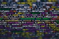 屏幕上生动特写着多色编程代码行