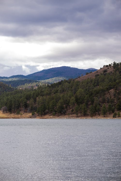 Photo of a Lake with a View of the Mountains 