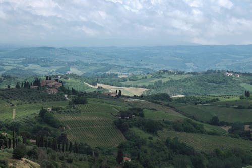Aerial View of a Countryside Landscape with Hills and Croplands 