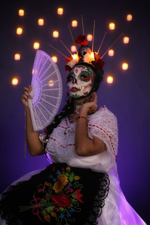 Portrait of Woman Wearing Mexican Costume with a Range