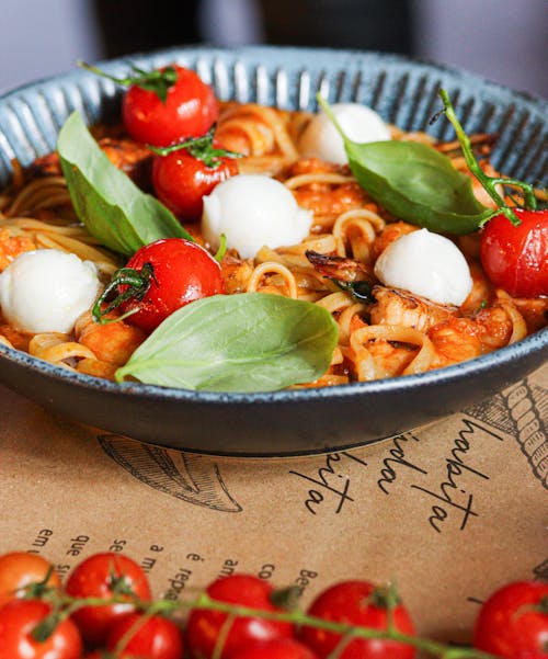 A Bowl with Pasta, Tomatoes and Mozzarella 