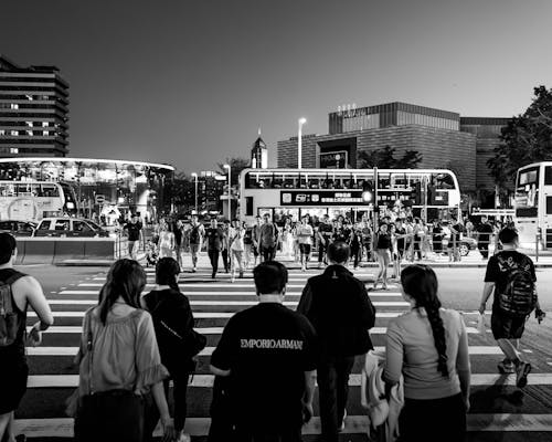 People on a Pedestrian Crossing in Black and White 