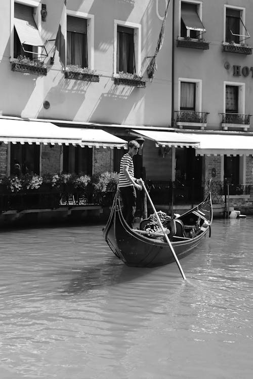Gondola Among Buildings in Venice in Black and White 