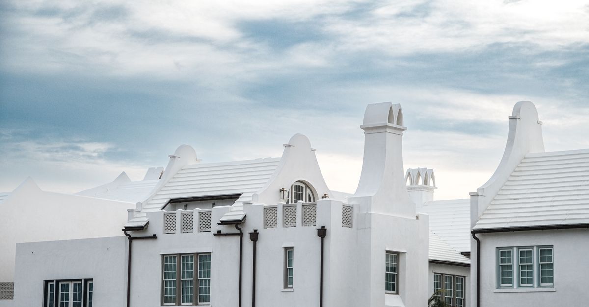 Beautiful white houses in Alys Beach, Florida showcasing distinctive architectural elegance.