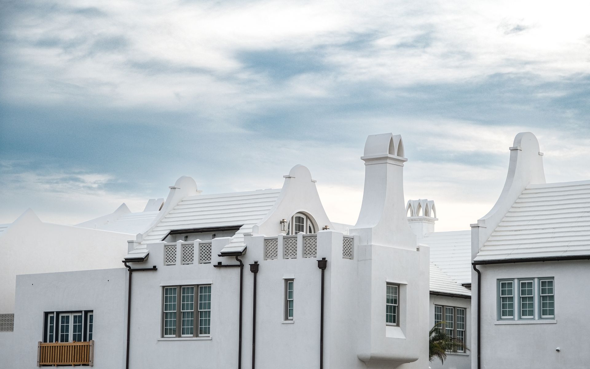 Beautiful white houses in Alys Beach, Florida showcasing distinctive architectural elegance.