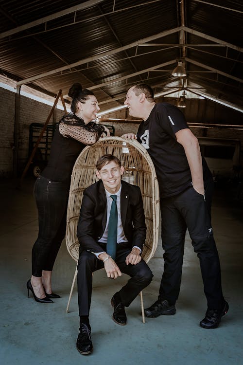 Family Posing in a Barn