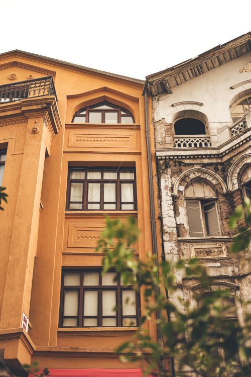 Free Explore the architectural contrast of renovated and crumbling facades in Ankara, Türkiye's urban area. Stock Photo
