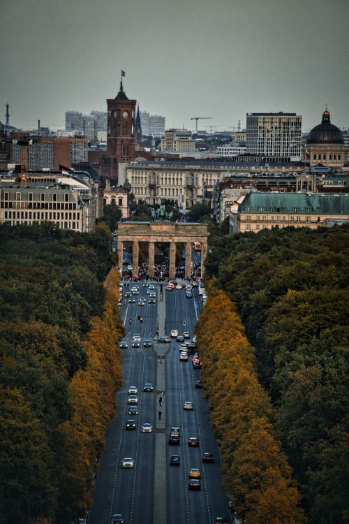 Free Stunning aerial shot of Berlin featuring the Brandenburg Gate and city skyline, perfect for travel and architecture themes. Stock Photo