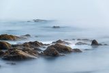 Misty waves over coastal rock, photo by Siglinde Luise on Pexels