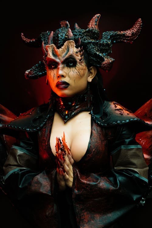 Woman Wearing a Devil Costume with Horns 